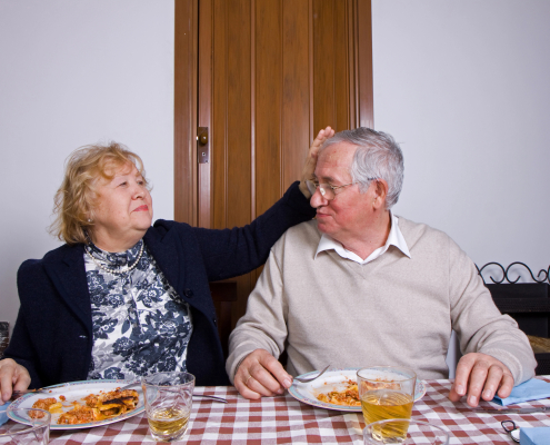 Elderly couple enjoying a meal at home supported by meal preparation services in Lancashire