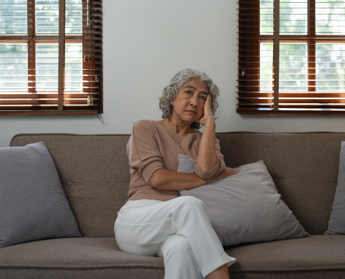 signs your loved one needs extra support at home - adult child checking on elderly parent